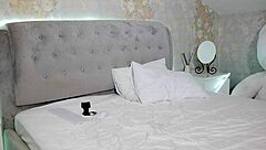 A student with big tits casually undresses on camera after her study session.