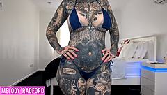 curvy milf with huge fake tits tries on micro bikini. she twerks seductively in bedroom haul.