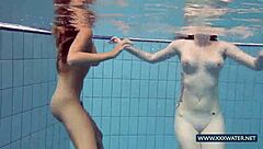 Katrin And Lucy Show Off Big Tits While Swimming Underwater In Bikinis At The Pool