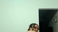 Suggestive chubby Latina prostitute dances sexy, strips naked, and thrusts her fat ass in POV