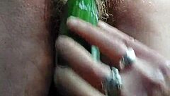 I fuck my hairy pussy with a cucumber