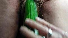 I fuck my hairy pussy with a cucumber