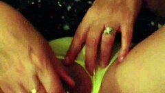 This milf slips into yellow panties and gets her pussy fingered deeply in a steamy homemade session. She moans as fingers explore every inch.