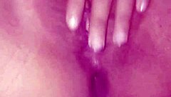 Indulging in a subtle solo masturbation session with gentle fingering and rising pleasure waves