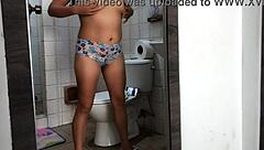 i'm recording myself undressing in the bathroom, showing off my big ass and huge tits