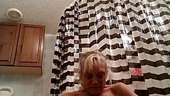 sassy brunette grabs massive dildo for intense solo fucking session. she pounds shaved pussy hard until explosive orgasm hits.