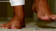 giant sexy woman squeezing and crushing small toys with feet in femdom fetish