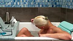 I enjoy bathing and shaving my curvy body with huge tits in the bathroom