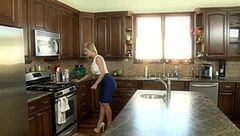 Seductive MILF indulges in steamy kitchen lesbian encounter with toys