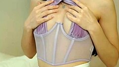 Petite teen displays her cute perfect tits in detailed view