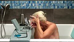 I enjoy bathing and shaving my curvy body with huge tits in the bathroom