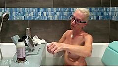 I enjoy bathing and shaving my curvy body with huge tits in the bathroom