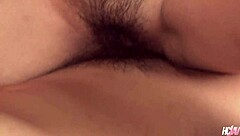 This busty Japanese slut named Ramu gets her hairy pussy fucked deep and hard by a guy.