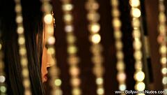 what makes this brunette so captivating in her sleek black dress?