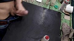 Skinny young amateur strokes huge cock solo on workbench at work