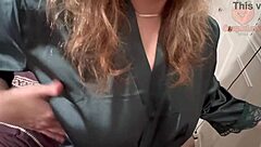 beautiful woman receives detailed breast exam at home