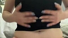 amateur with great natural pierced tits stuffs her panties in her wet puffy pussy to masturbate