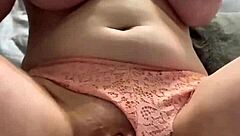 amateur with great natural pierced tits stuffs her panties in her wet puffy pussy to masturbate