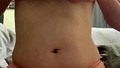 amateur with great natural pierced tits stuffs her panties in her wet puffy pussy to masturbate