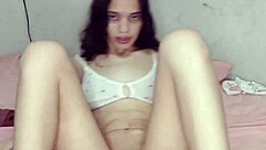 Huge dildo penetrates Brazilian bisexual in close-up fetish play.