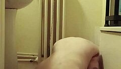 Amateur milf bound in BDSM humiliation session flashing natural tits as submissive slave in 2024.