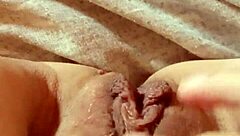 Hey, watch this milf spreading her wet pussy wide open for you