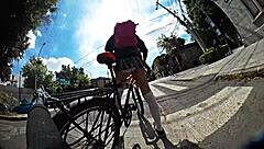 Exhibiting miniskirt upskirt through city streets with pigtails and socks