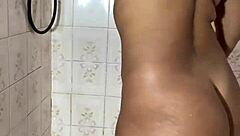 Hidden Camera Captures Brunette Urinating and Masturbating