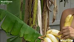 Brunette rides and takes facial after going wild with banana play in interracial fun