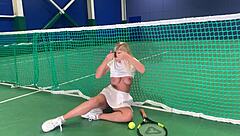 a blonde on a tennis court