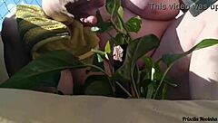 flashing big natural tits outdoors while watering plants naked for public exhibition