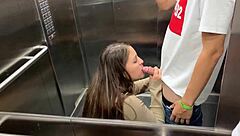Blonde and Latina babes lick and blow big cock in public elevator after party.
