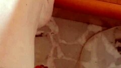 Brunette milf greta applies nail polish to her toenails in homemade amateur video