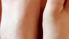 Brunette milf greta applies nail polish to her toenails in homemade amateur video