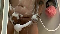 Let's play wet in the shower with my tattooed body