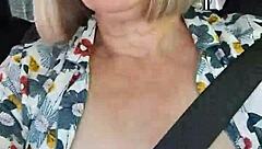 Hey, check out my naughty housewife flashing her tits in this homemade car selfie!