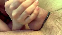 Sexy amateur gives handy handjob to monster big cock in close up