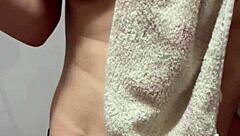 beautiful busty married woman poses nude before intimate encounter with clean nipples