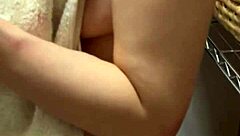 beautiful busty married woman poses nude before intimate encounter with clean nipples