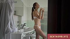 Hot blonde model delivers seductive binaural asmr with long legs in lingerie