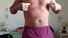 pervy guy trying to stay warm in snow by rubbing his bulge in shorts and thong