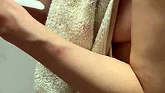 beautiful busty married woman poses nude before intimate encounter with clean nipples