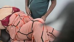 Indian Doctor Examining Lady Patient In Clinic