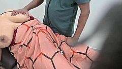 Indian Doctor Examining Lady Patient In Clinic