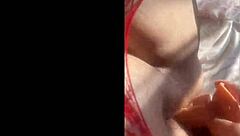 Hey, watch this curvy Latina in red body shoving dildo deep moaning wildly  