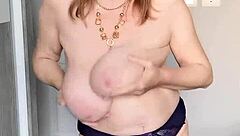 i see this busty mature milf in stockings posing closeup