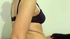 Young 18+ British brunette coed hints at horny dildo riding and squirting in high definition POV webcam tease.