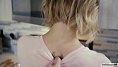 Evelin deepthroats big cock before intense doggystyle pounding in kitchen