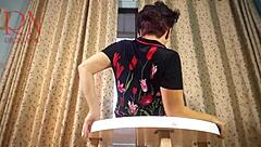 Curvy housewife in pantyhose and heels teases with striptease at round table