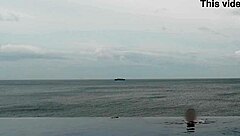 skinny japanese college girl's infinity pool tease